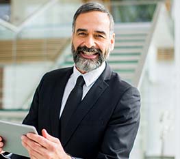 middle-age-businessman-with-tablet-in-the-office-2023-11-27-05-23-46-utc.jpg